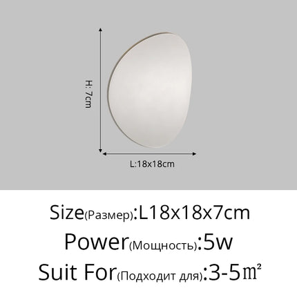 Wall light fixture with dimensions and power rating on a gray background

