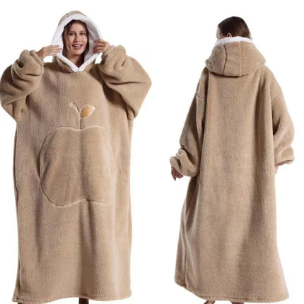 Beige fleece poncho with hood worn by a person on a white background

