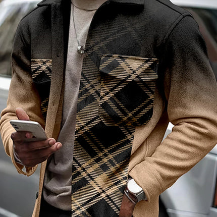 Man wearing a patterned jacket with plaid design, holding a phone.

