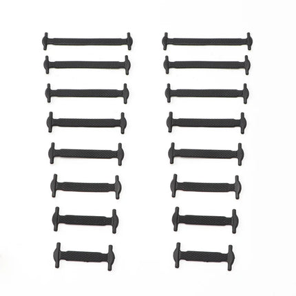 Multiple black rubber bungs arranged in two rows on a white background

