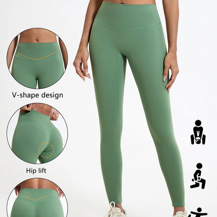 Green leggings with V-shape design, hip lift, and deep V feature on a white background.

