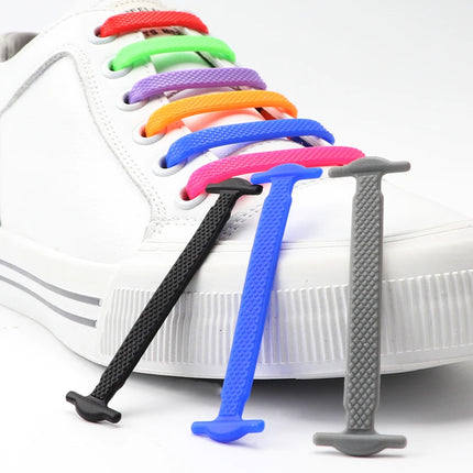 Colorful shoelace extenders on a white sneaker with a white background

