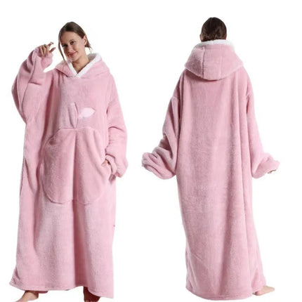Pink hooded blanket worn by a person on a white background

