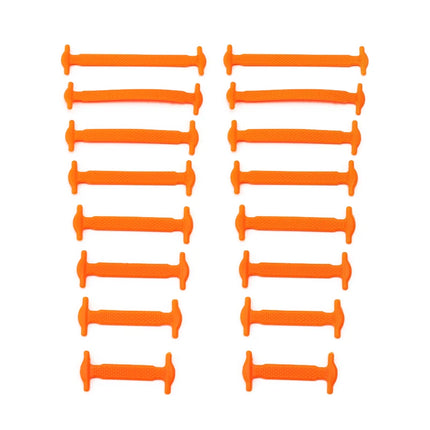 Multiple orange plastic components arranged in rows on a white background

