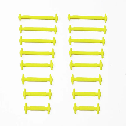 Multiple yellow plastic buttons arranged in rows on a white background

