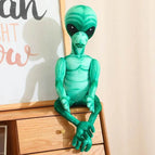 green alien ad